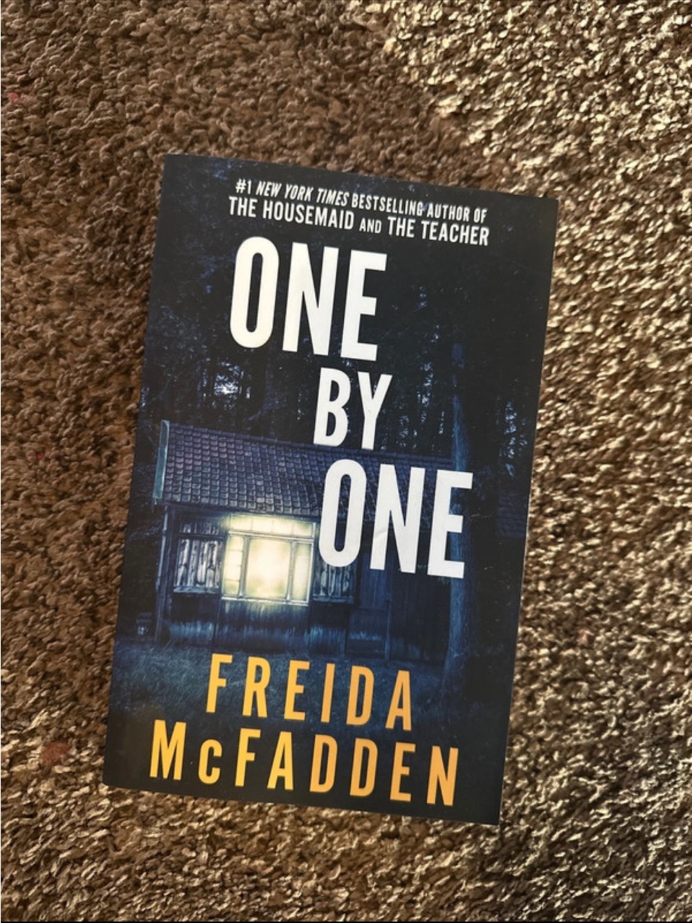 One by One by Freida McFadden - Blue Cover